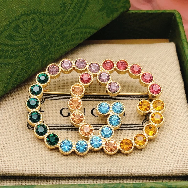 Gvc*1 brooches